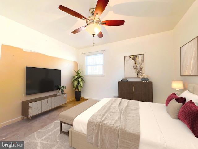 bedroom with ceiling fan and light colored carpet