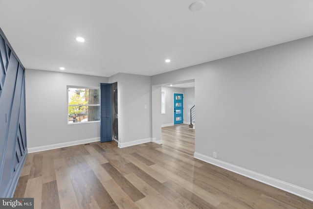 spare room featuring light hardwood / wood-style flooring