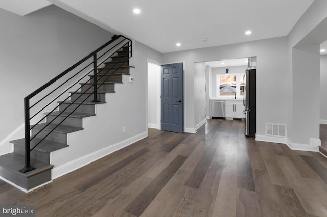 interior space with hardwood / wood-style flooring