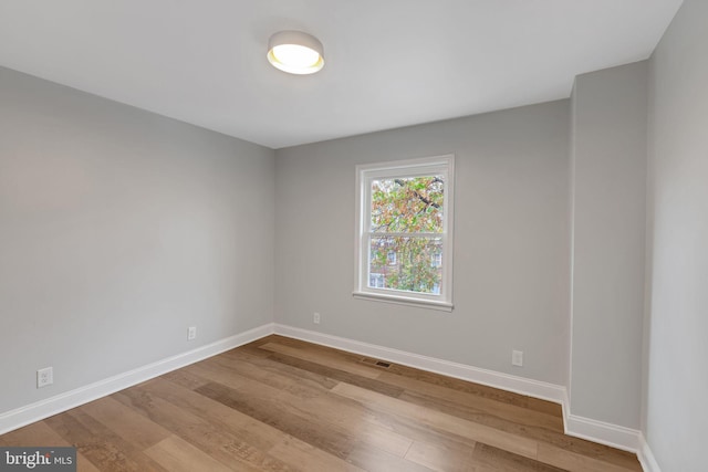 empty room with light wood-type flooring