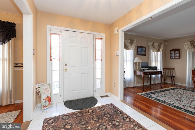 foyer with plenty of natural light and light wood-type flooring