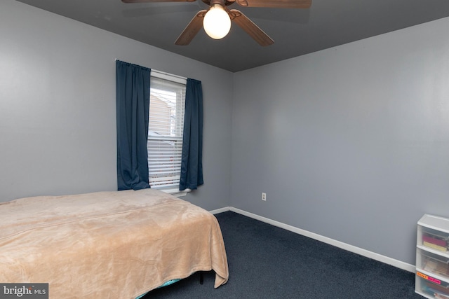 bedroom featuring ceiling fan and carpet floors