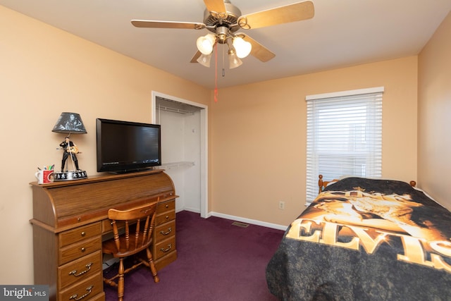 bedroom featuring ceiling fan, a closet, and dark colored carpet