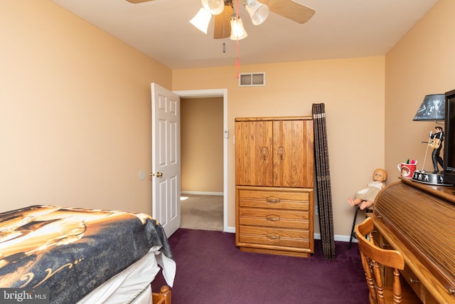 bedroom featuring ceiling fan and dark colored carpet