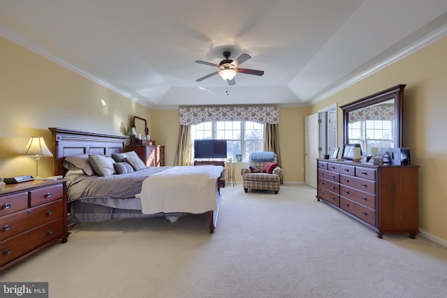 carpeted bedroom featuring ornamental molding, multiple windows, and ceiling fan