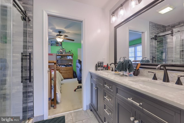 bathroom featuring vanity, an enclosed shower, tile patterned flooring, and ceiling fan