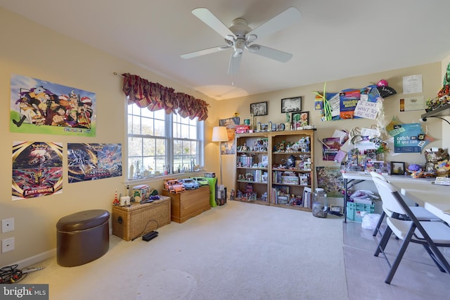 interior space featuring carpet floors and ceiling fan