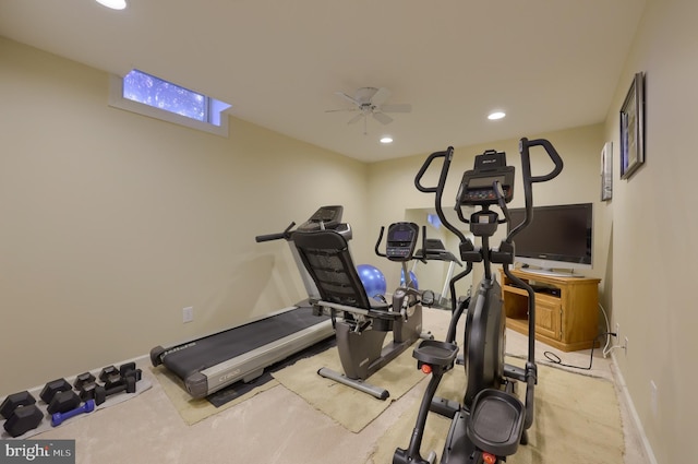 workout room with light colored carpet and ceiling fan