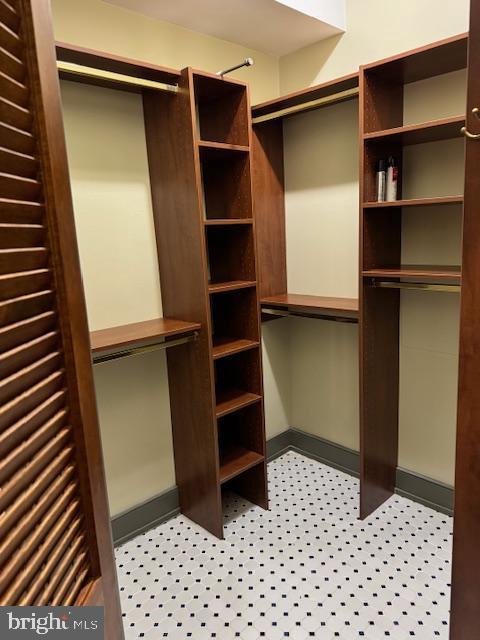 28 The Strand, New Castle, DE 19720 - walk in closet featuring light flooring