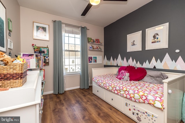 bedroom featuring dark hardwood / wood-style floors and ceiling fan