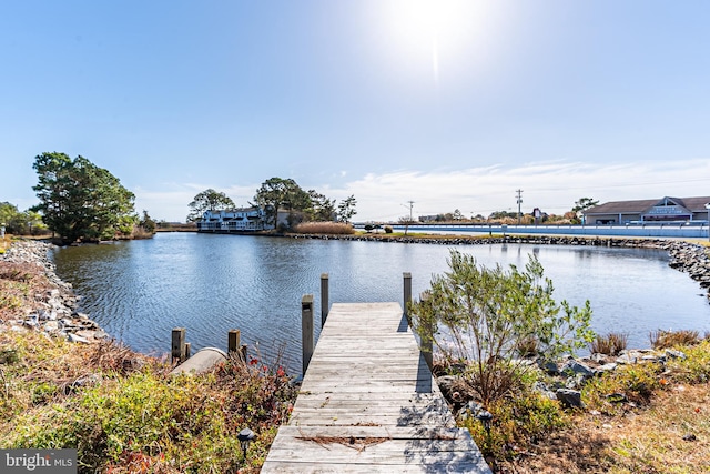 view of dock with a water view