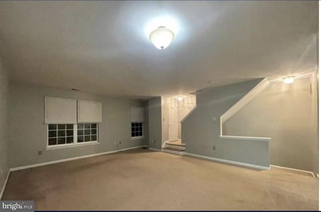 basement with light carpet