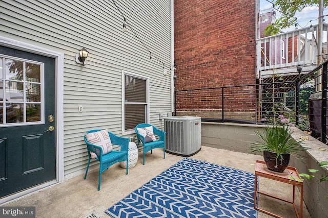 view of patio / terrace with central air condition unit