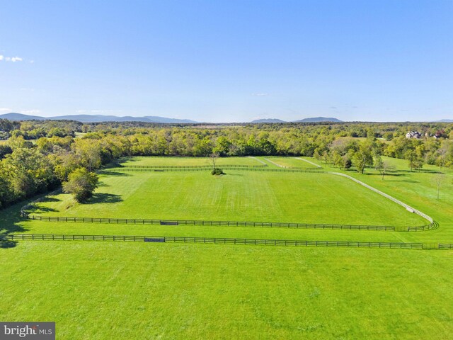 bird's eye view featuring a mountain view and a rural view