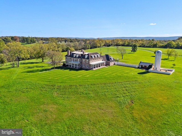 birds eye view of property featuring a rural view