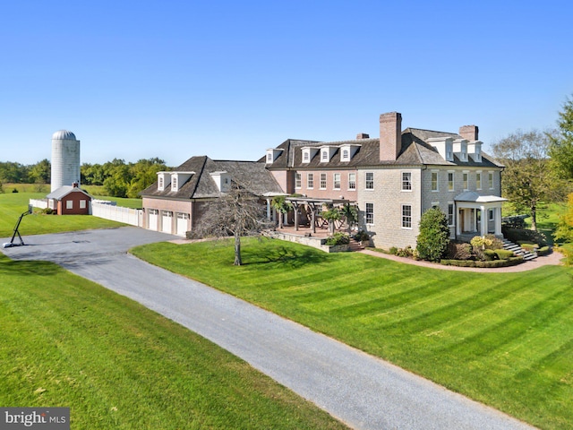 exterior space with a front yard