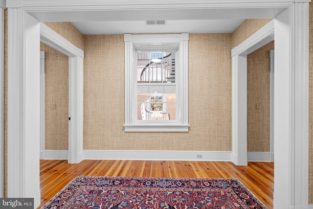 hallway featuring hardwood / wood-style floors