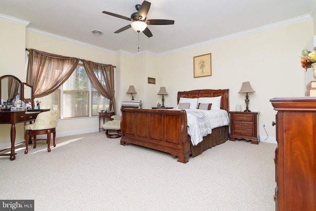 bedroom featuring light colored carpet, ceiling fan, and crown molding