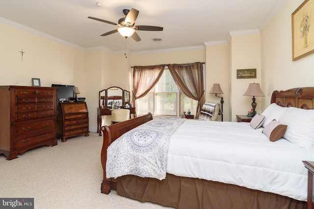 bedroom with light colored carpet, ceiling fan, and crown molding