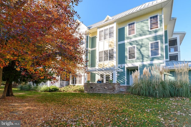 view of front of home with a front yard