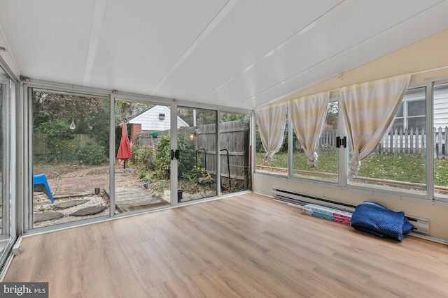 unfurnished sunroom with vaulted ceiling