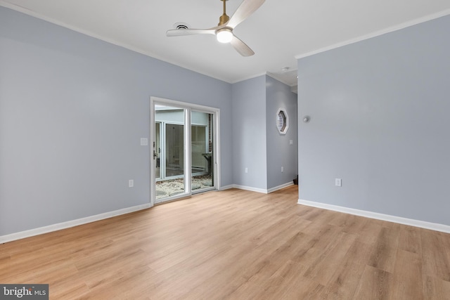 empty room featuring crown molding, ceiling fan, and light hardwood / wood-style floors