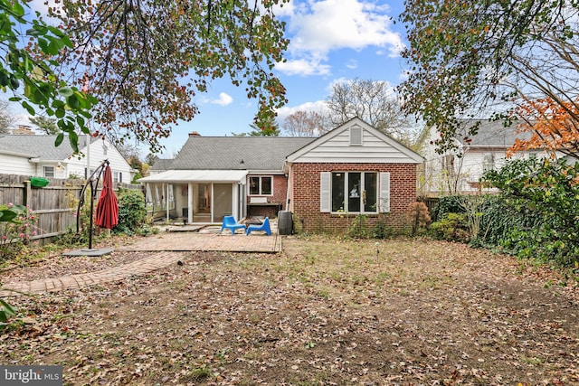 back of house featuring a patio