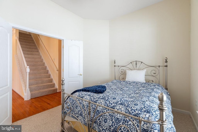 bedroom featuring hardwood / wood-style floors