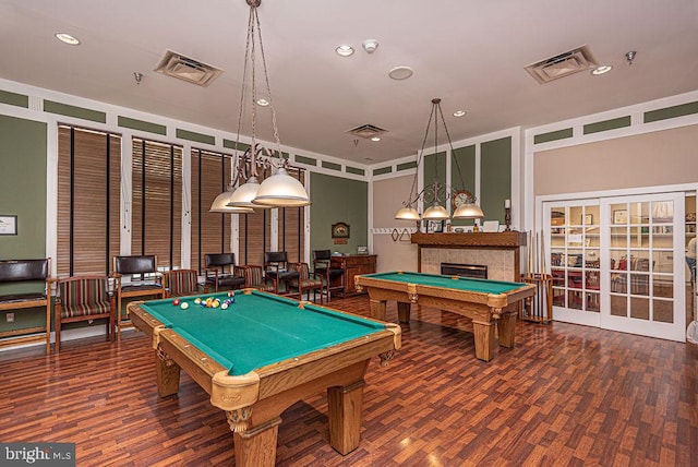 playroom featuring dark hardwood / wood-style floors and pool table