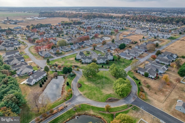 5003 E Pebble Ln Unit J, Milford, DE 19963 - aerial view of property and surrounding area with nearby suburban area and a large body of water