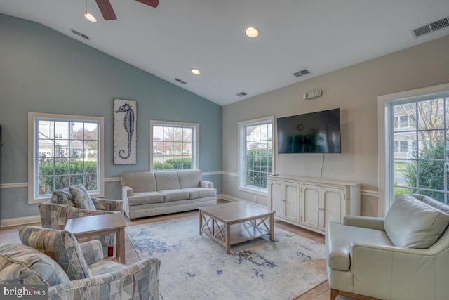 5003 E Pebble Ln Unit J, Milford, DE 19963 - living area featuring vaulted ceiling, recessed lighting, wood finished floors, ceiling fan, and baseboards