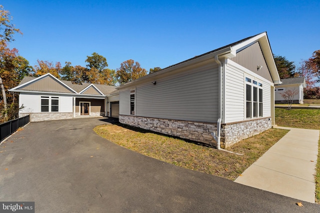 view of front of house with a carport