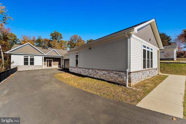 view of front of home featuring a carport