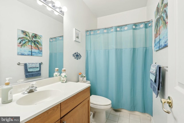 bathroom with tile patterned floors, vanity, toilet, and a shower with curtain