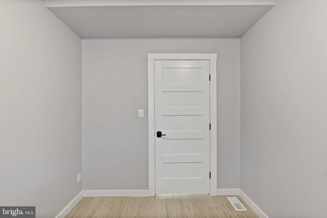 empty room with light wood-type flooring