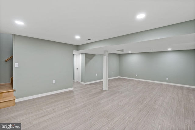 basement with light wood-type flooring