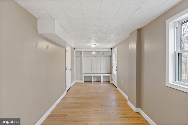 hallway featuring light hardwood / wood-style flooring