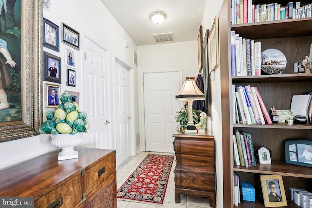 interior space featuring light tile patterned flooring