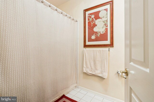 bathroom with tile patterned flooring