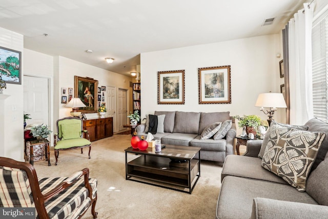 living room with light carpet