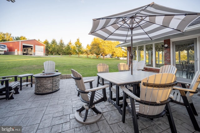 view of patio / terrace with an outdoor fire pit