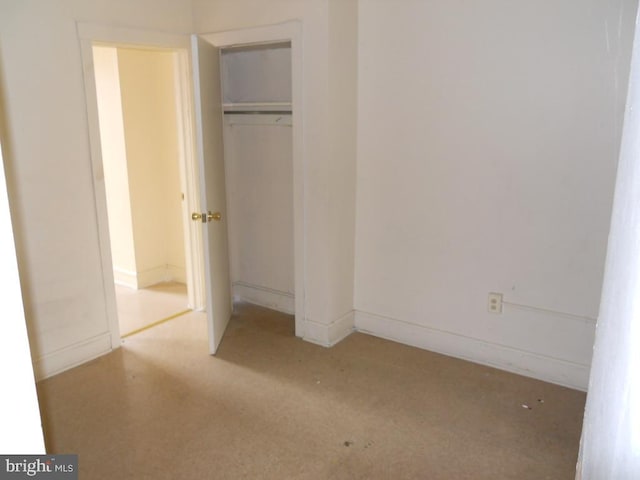 unfurnished bedroom with a closet