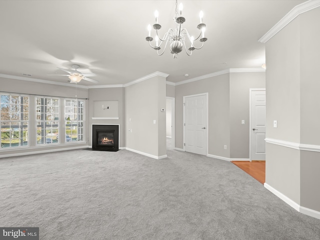 unfurnished living room with crown molding, light colored carpet, and ceiling fan with notable chandelier