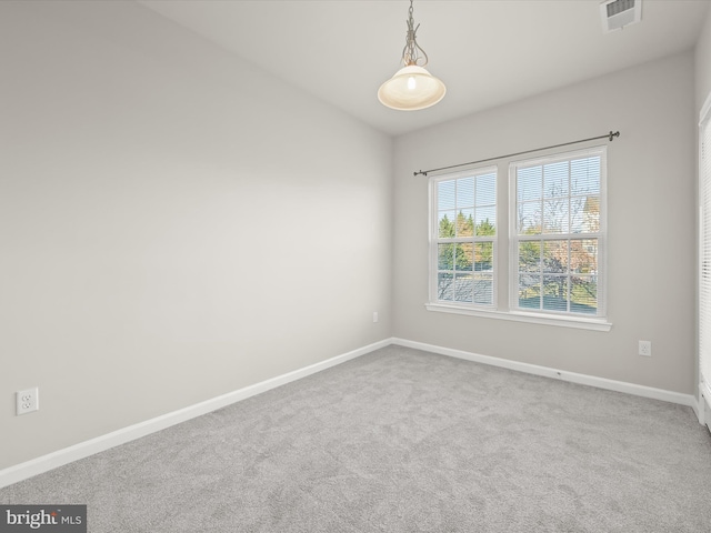 unfurnished room with carpet