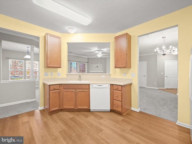 kitchen with white dishwasher, ceiling fan with notable chandelier, sink, ornamental molding, and light hardwood / wood-style floors