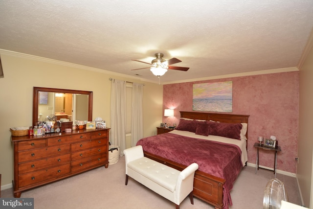 carpeted bedroom with ceiling fan, a textured ceiling, and ornamental molding