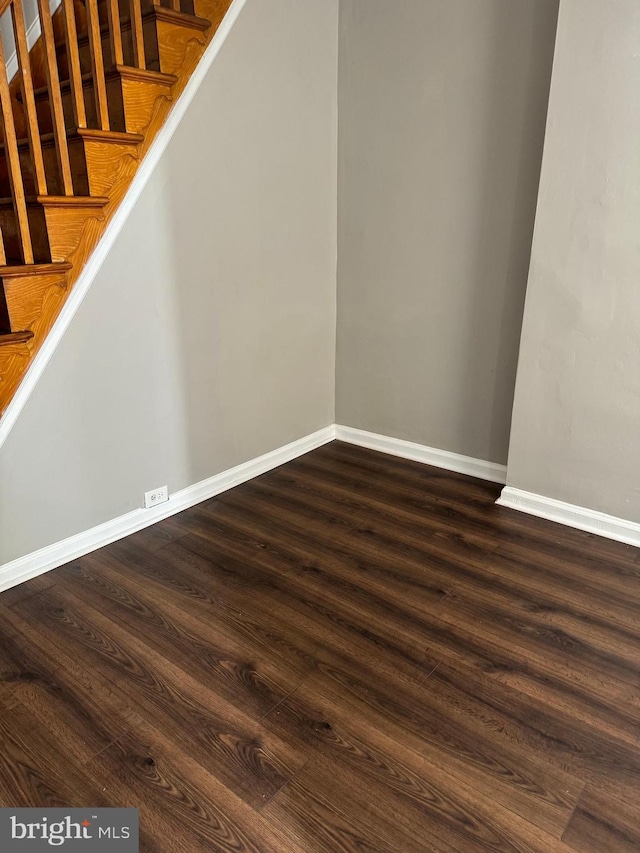 stairs with wood-type flooring