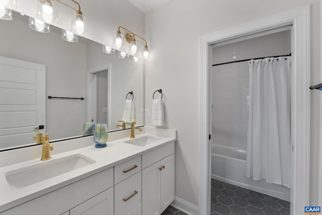 bathroom featuring vanity, shower / bath combination with curtain, and tile patterned floors