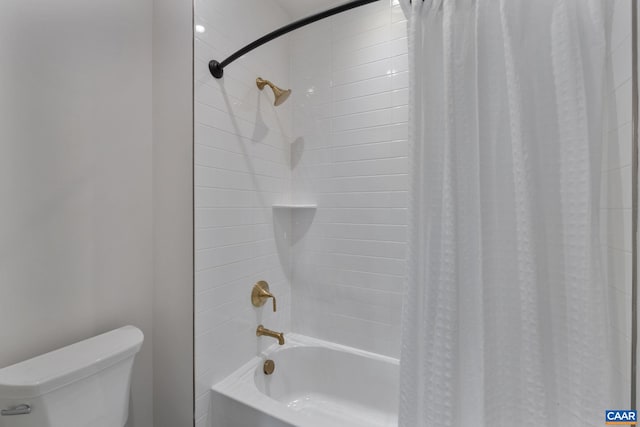 bathroom with shower / bathtub combination with curtain and toilet