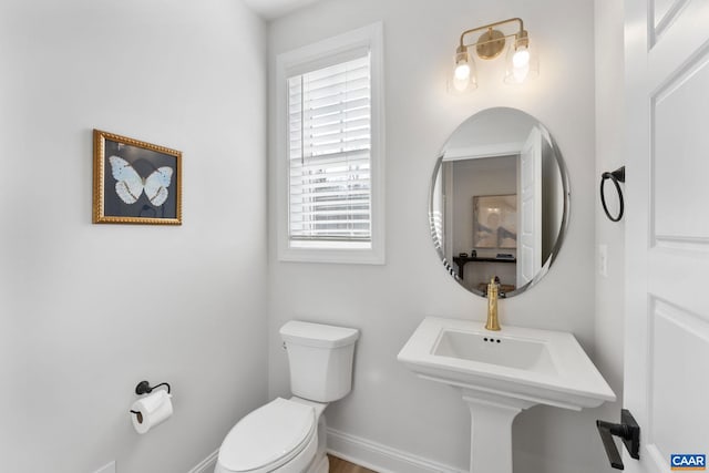 bathroom featuring toilet